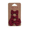 Set of 2 little bows and a medium bow on duck clips