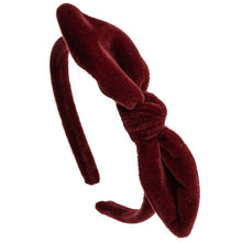  Velvet lined headband with a tied bow